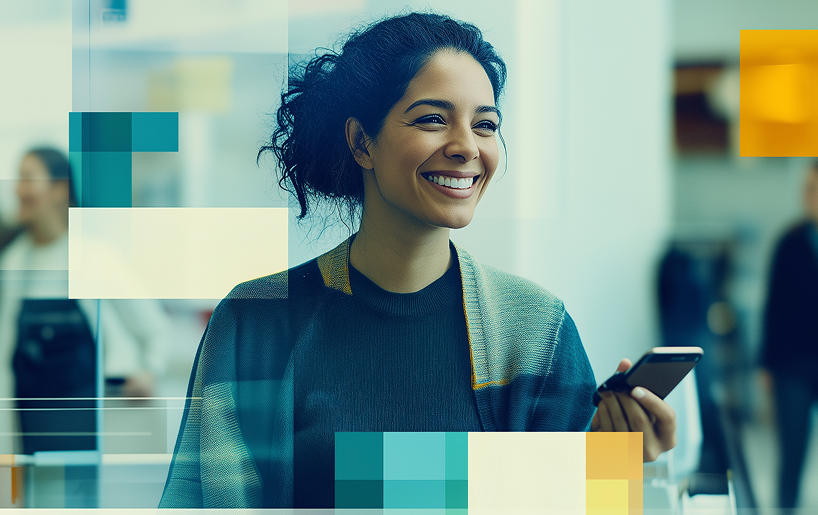 a woman smiling and holding a smart phone