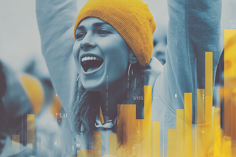 a young woman cheering at a sporting event