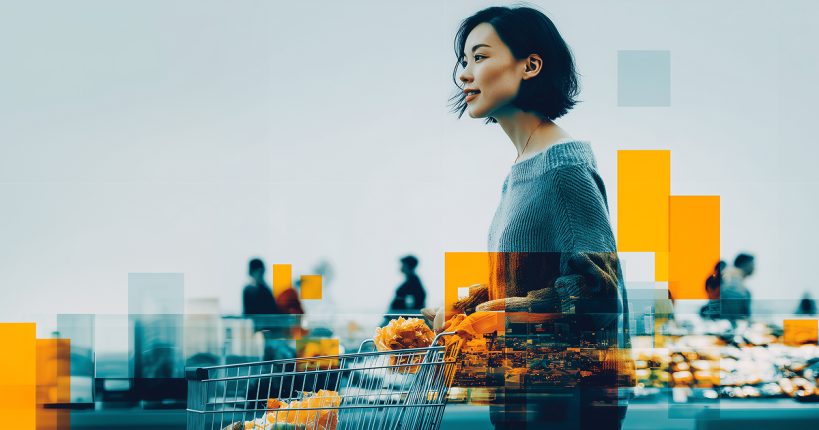 A woman with short dark hair pushing a grocery cart full of products, with a blue-and-yellow pixelation effect around her.